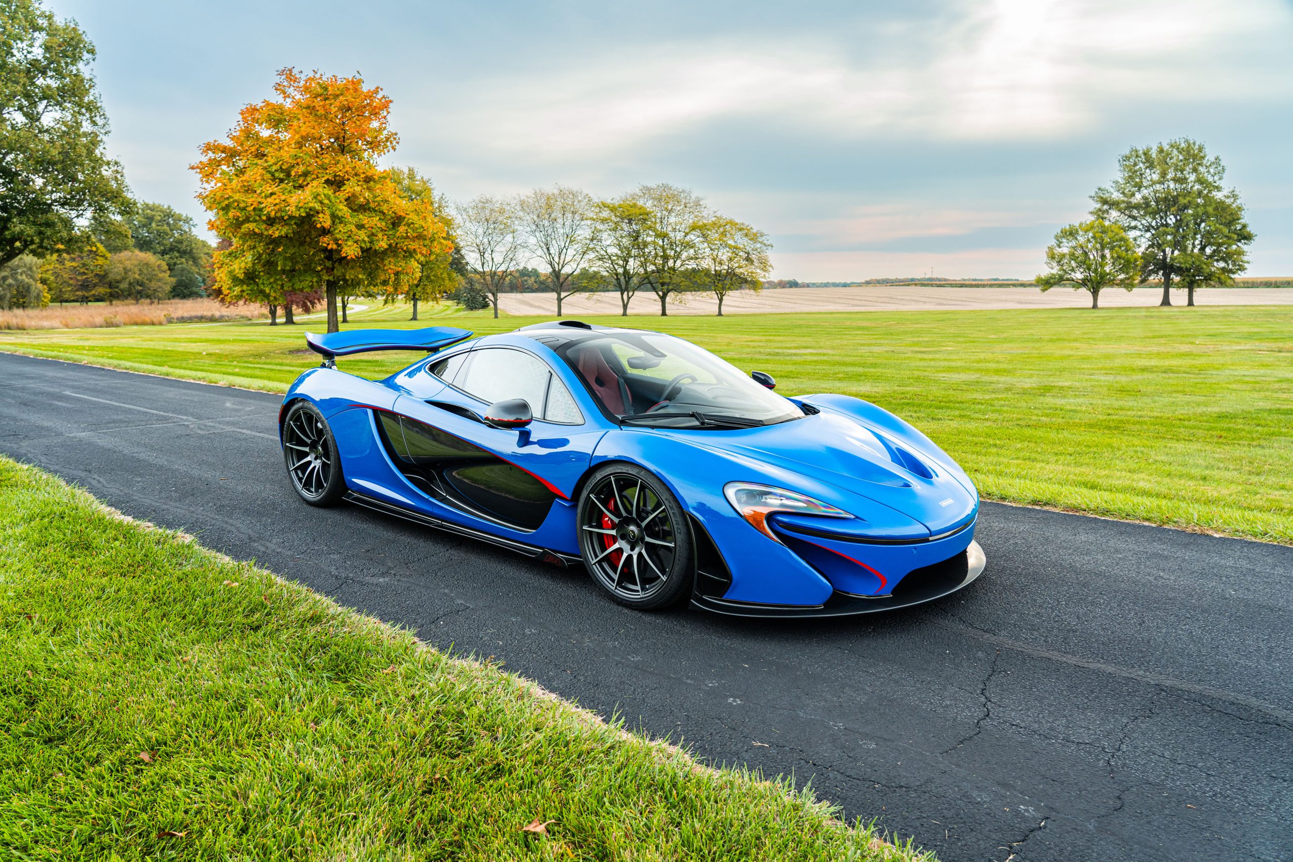 RM Sotheby's To Auction A McLaren P1 And Porsche 918 Spyder Both Finished In Blue