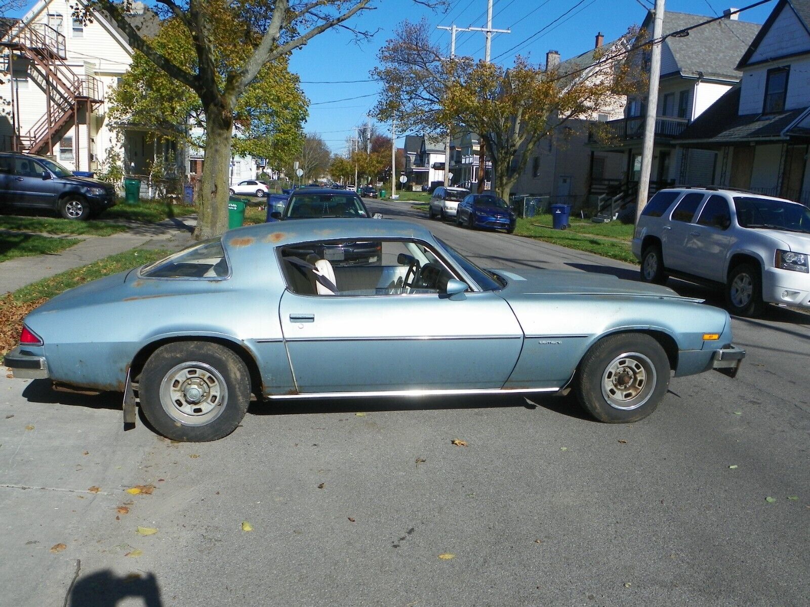 a tractor didn t like this 1977 chevrolet camaro car parked in a barn most of its life 232585 1.jpeg