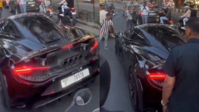 Viral Video Shows Security Guards Protecting McLaren Supercar In Traffic Jam