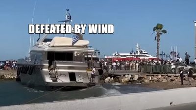 wind blows yacht why onto the beach and then into the pier 233461 1.jpg