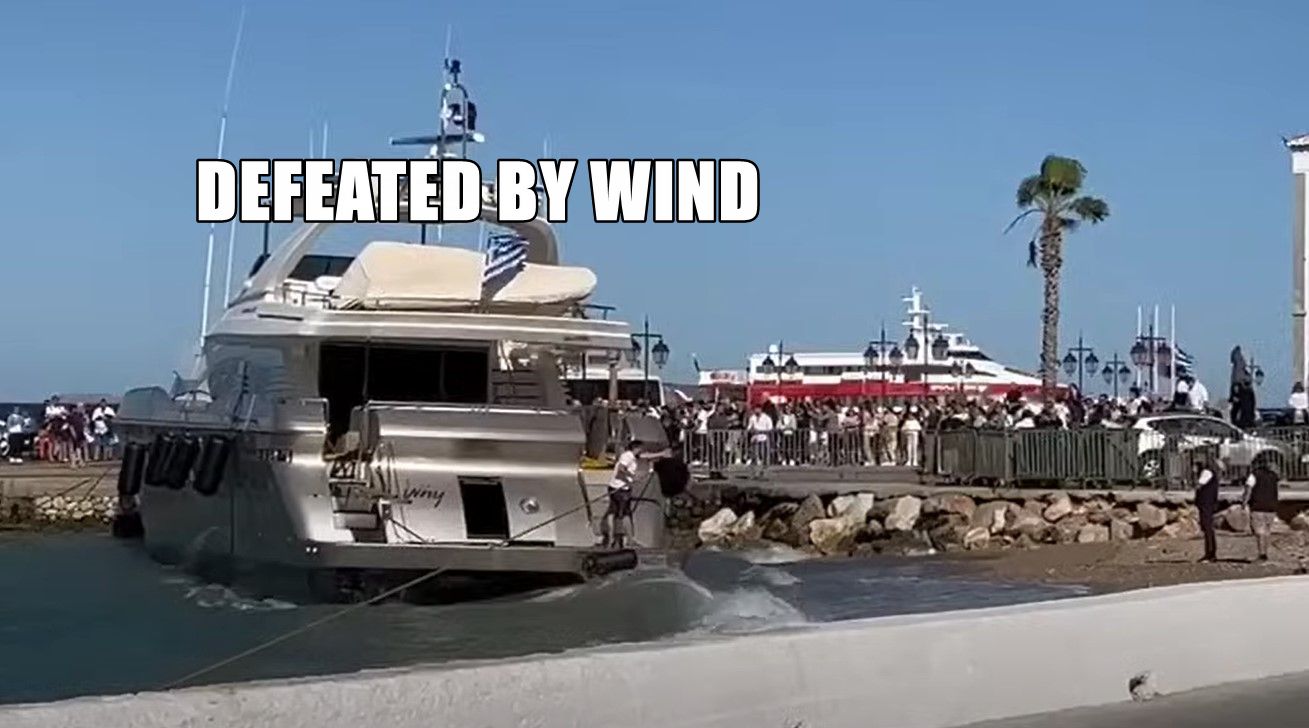 wind blows yacht why onto the beach and then into the pier 233461 1.jpg