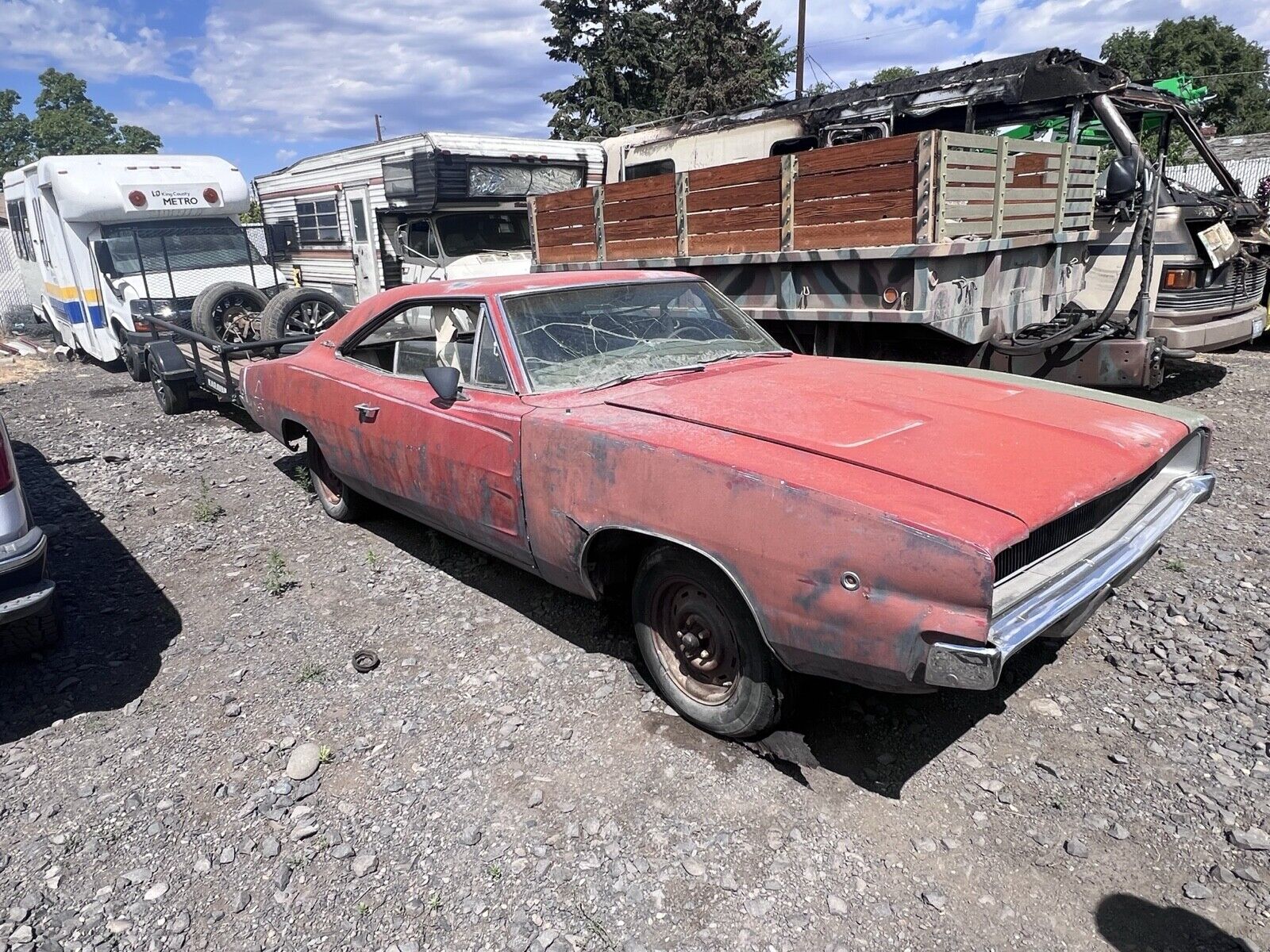 1968 dodge charger rotting away in someone s yard hides mysterious muscle 236255 1.jpeg