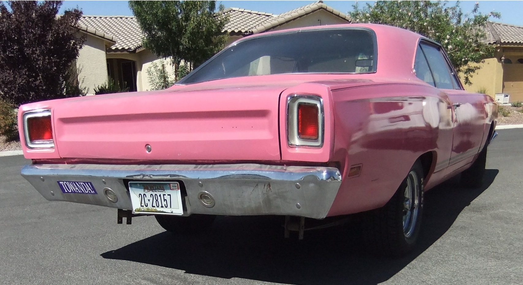 one of none 1969 plymouth road runner flexes pink paint unexpected v8 under the hood 236035 1.jpg