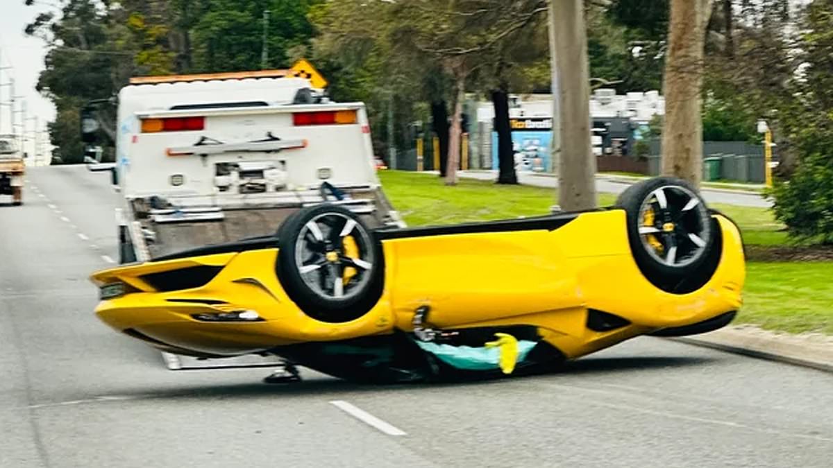 Ferrari flips onto its roof